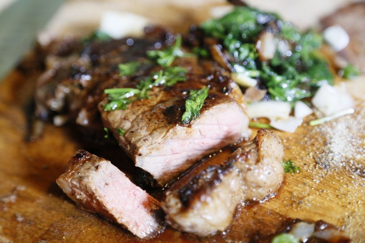 Balsamic-Glazed Rib Steak with Parsley and Onion