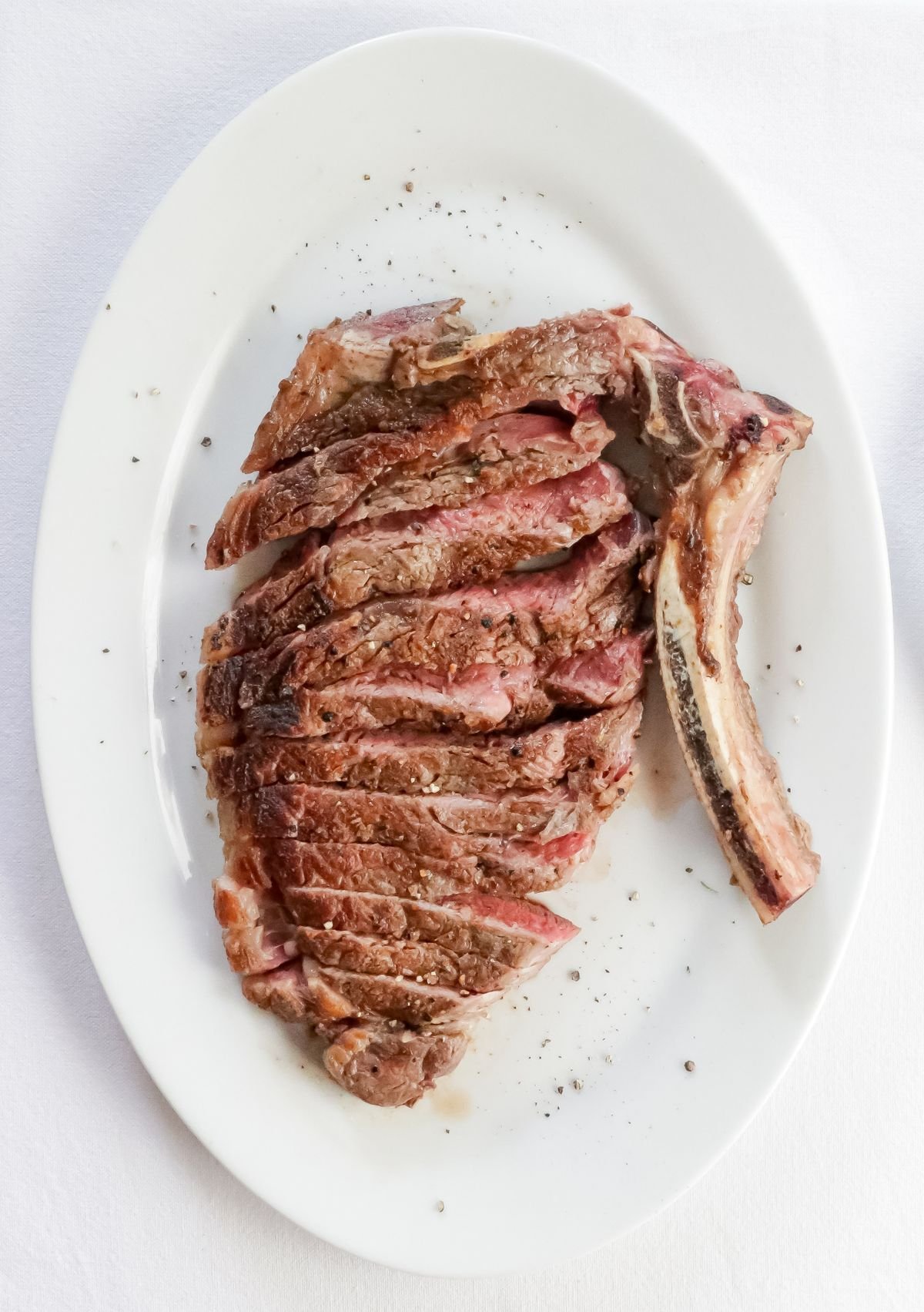 Carved Bone-In Ribeye with Cracked Pepper