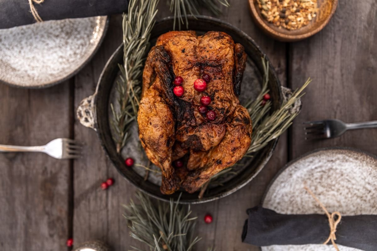 Cast Iron Roast Chicken with Cranberries and Rosemary