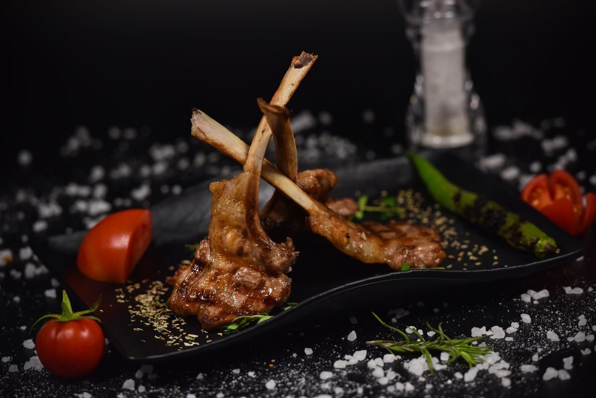 Garlic Lamb Lollipops with Blistered Tomatoes