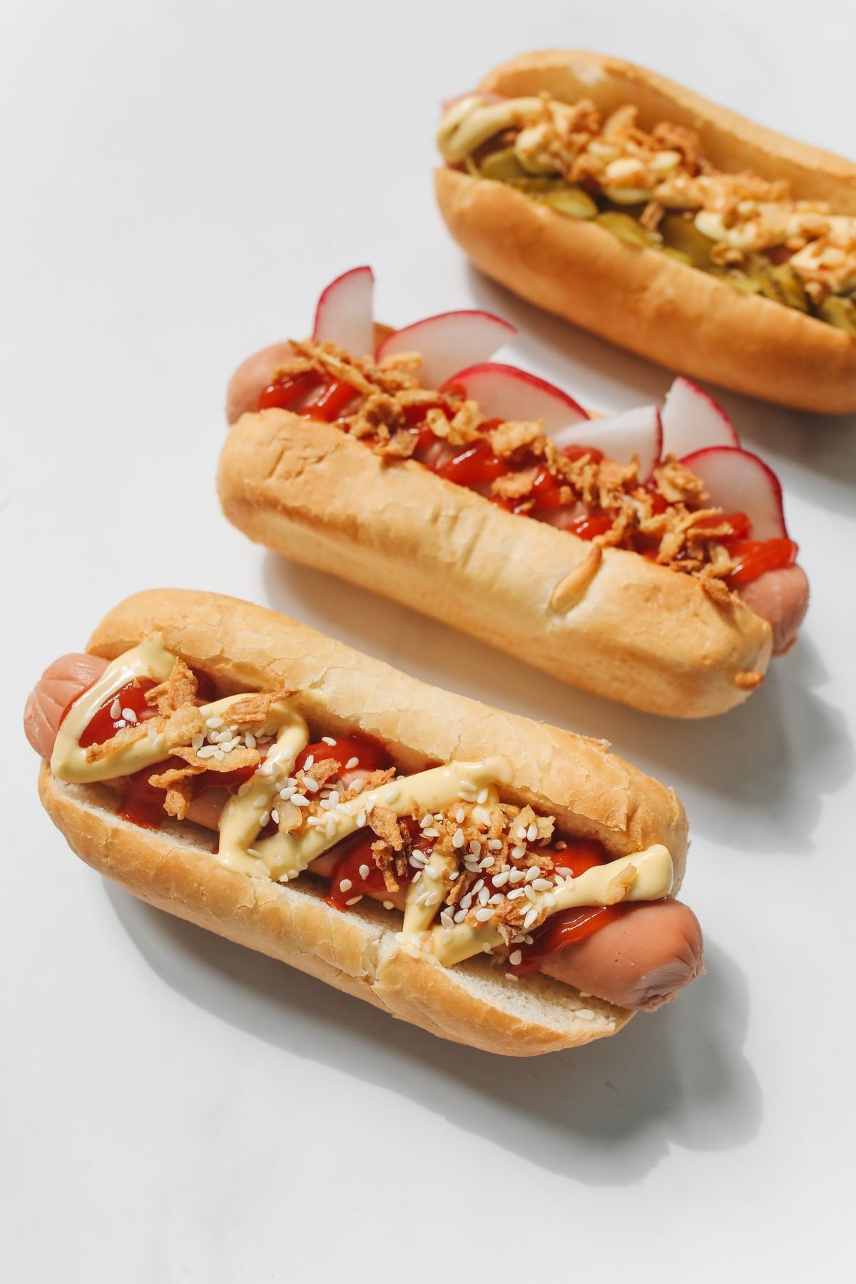 Loaded Hot Dogs with Sriracha Mayo and Crispy Shallots