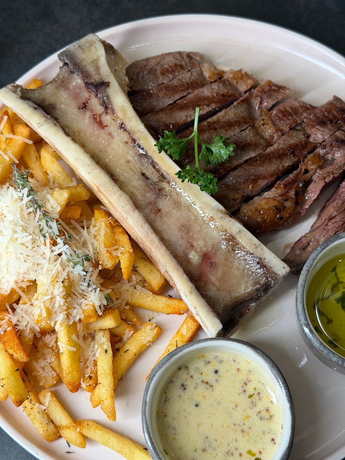 Rump Steak with Roasted Bone Marrow and Parmesan Fries